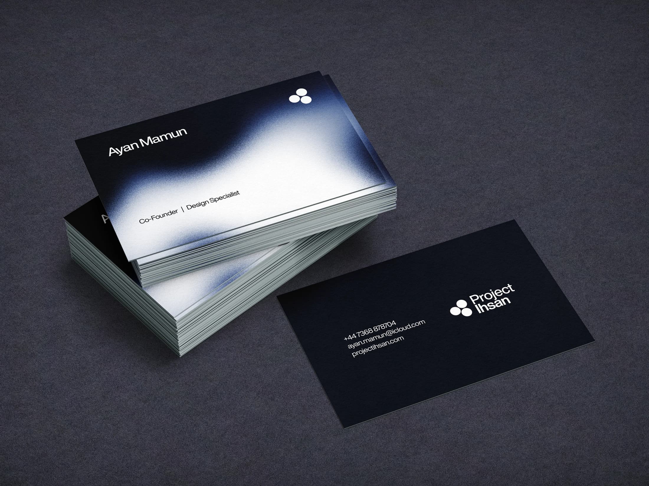 Project Ihsan stationery mockup with a soft blue light field and compact white identity